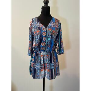 Mama Chica Womens Blue Romper with a Floral Print